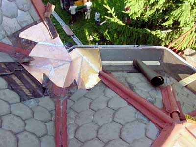 Copper Snow Aprons at slate roof central - installing standing seam where two valleys meet