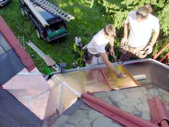 Copper Snow Aprons at slate roof central - installing standing seam on octagon dormer