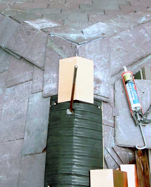 Slate Roof Central - Installing a ventilated slate ridge.