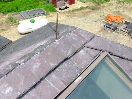 Slate Roof Central - Installing ventilated slate ridges.