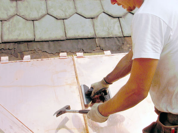 One Way To Install Standing Seam Copper Snow Aprons on a Slate Roof