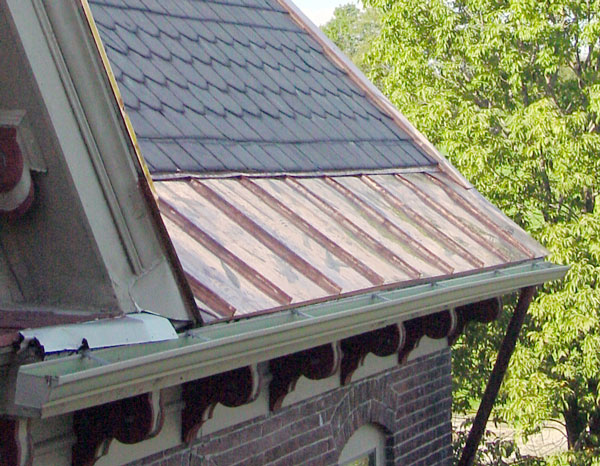 One Way To Install Standing Seam Copper Snow Aprons on a Slate Roof