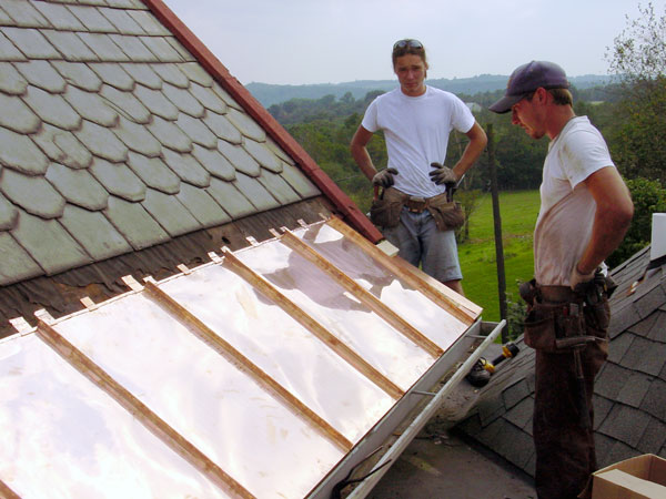 One Way To Install Standing Seam Copper Snow Aprons on a Slate Roof